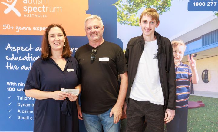 Principal Anna Brady with Bruce Gunter and son Peter Gunter