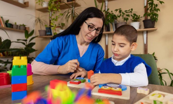 Speech pathologist with Autistic boy