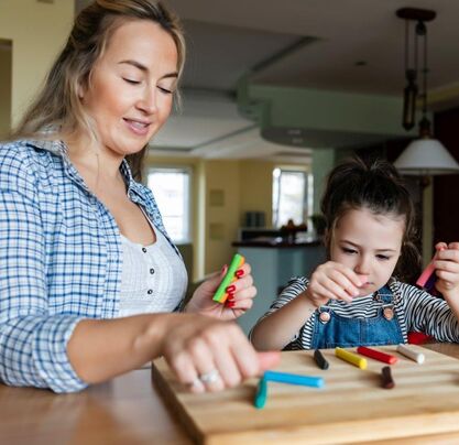 Occupational therapist with girl