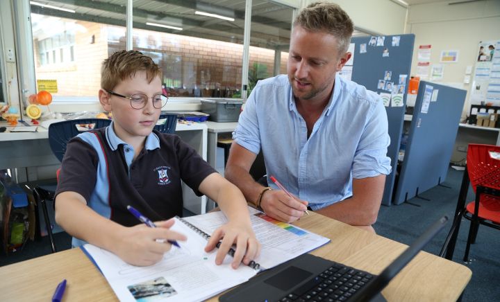 Student and teacher at Aspect South Coast School