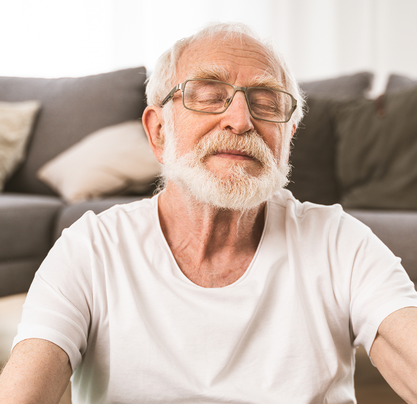 Old man meditating