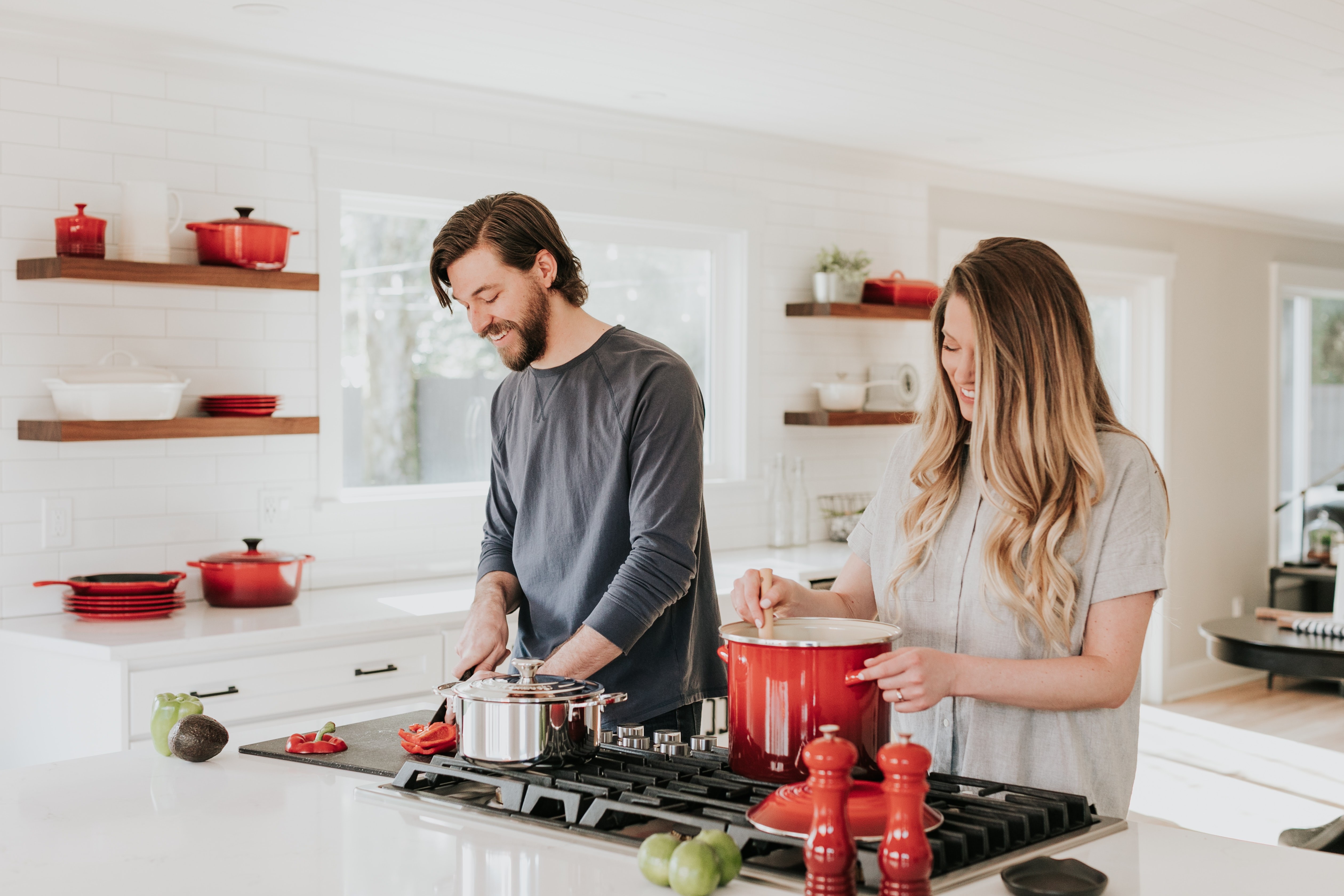 Two people cooking